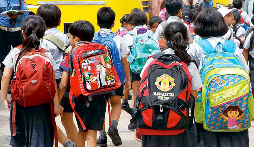 School-kids-with-heavy-bags.jpg